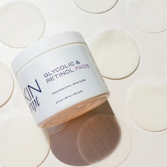 Skin Script glycolic and retinol pads on background of round textured off-white pads