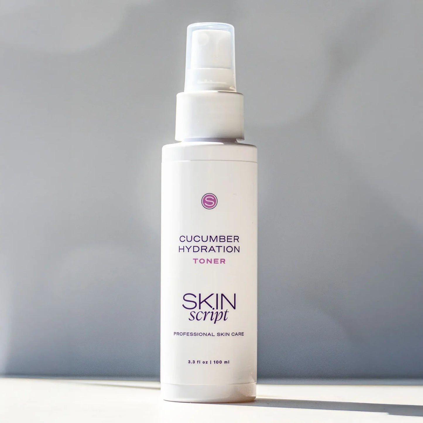 Skincare bottle labeled 'Cucumber Hydration Toner' by 'Skin Script' on a gray background