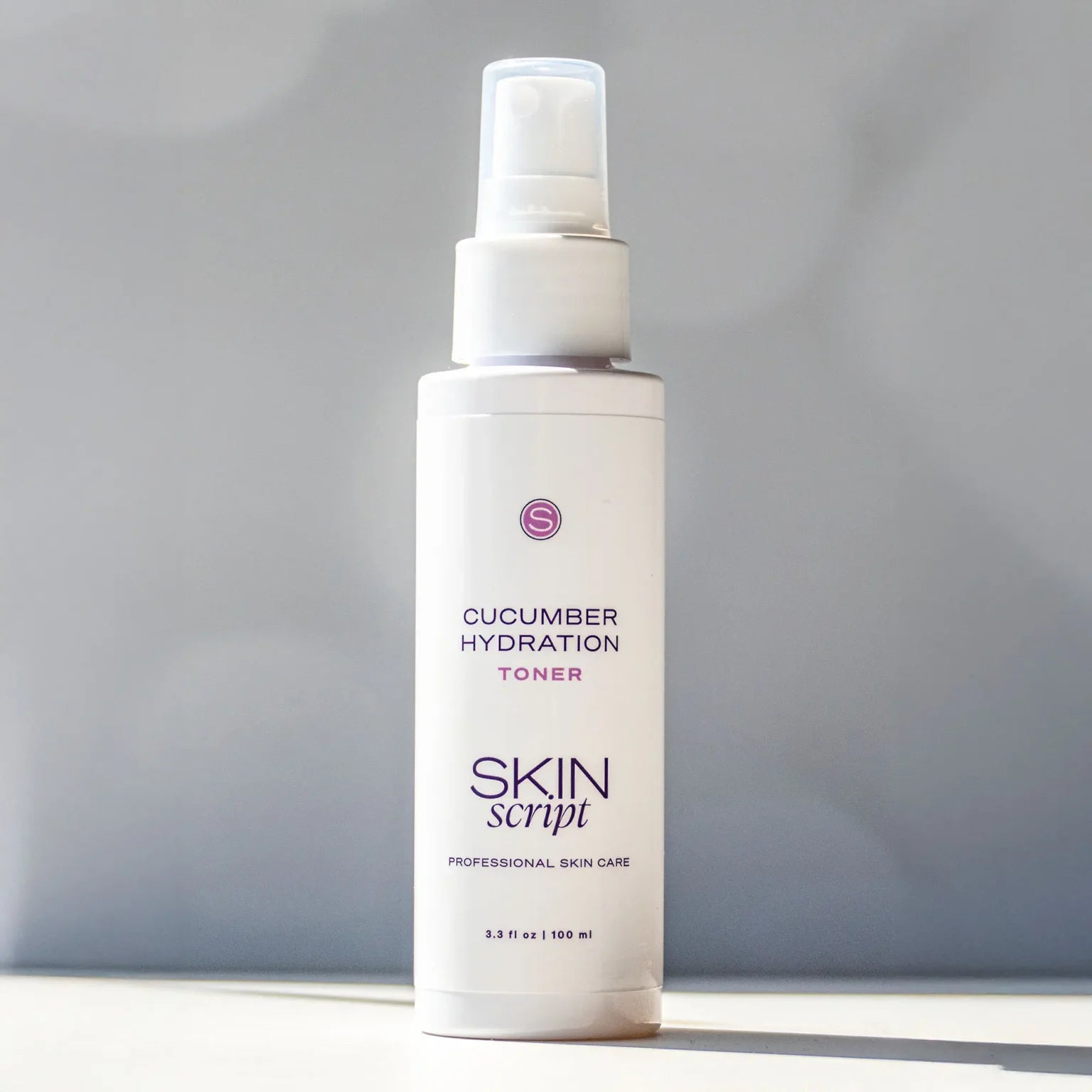 Skincare bottle labeled 'Cucumber Hydration Toner' by 'Skin Script' on a gray background