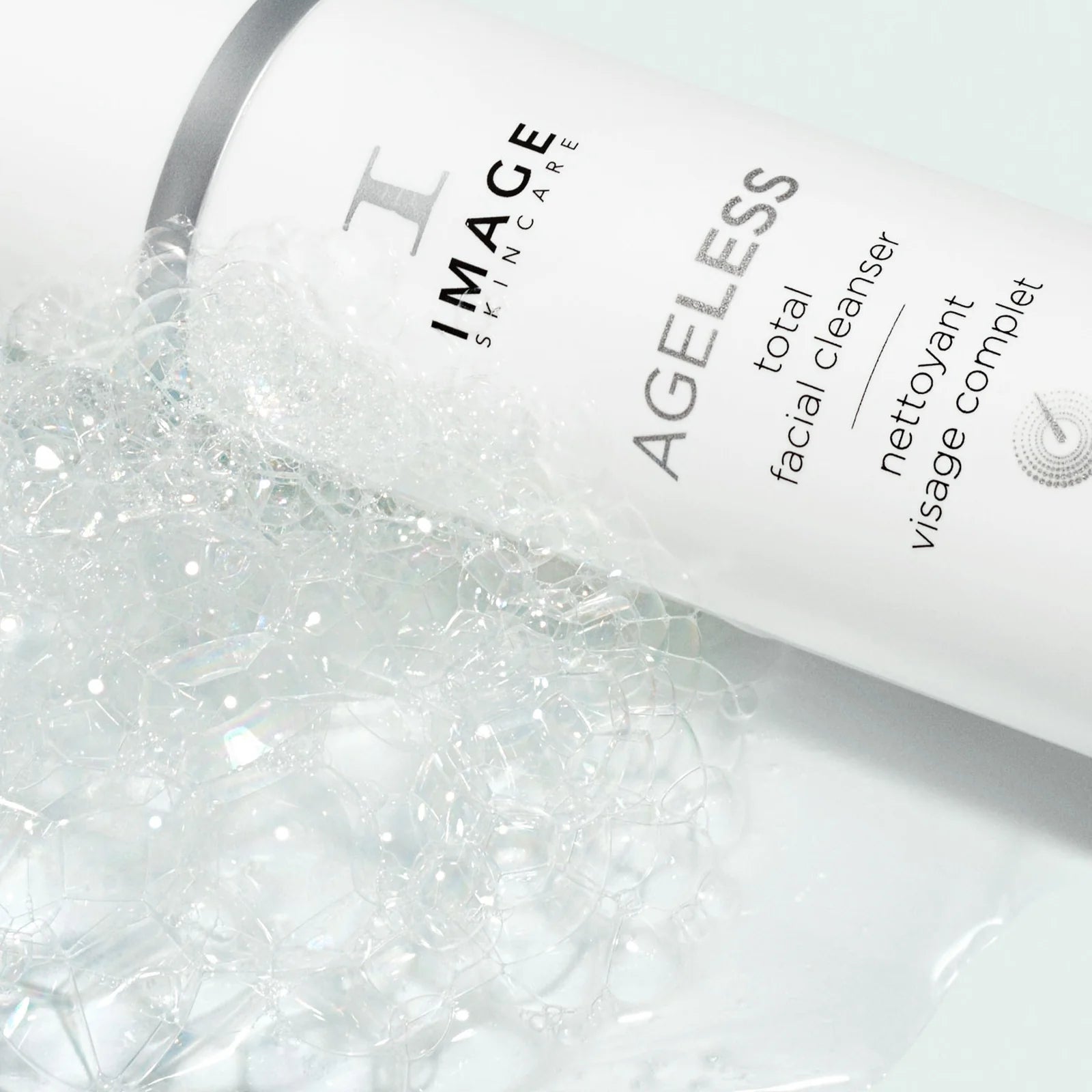 IMAGE Skincare AGELESS total facial cleanser bottle with bubbles on a white background