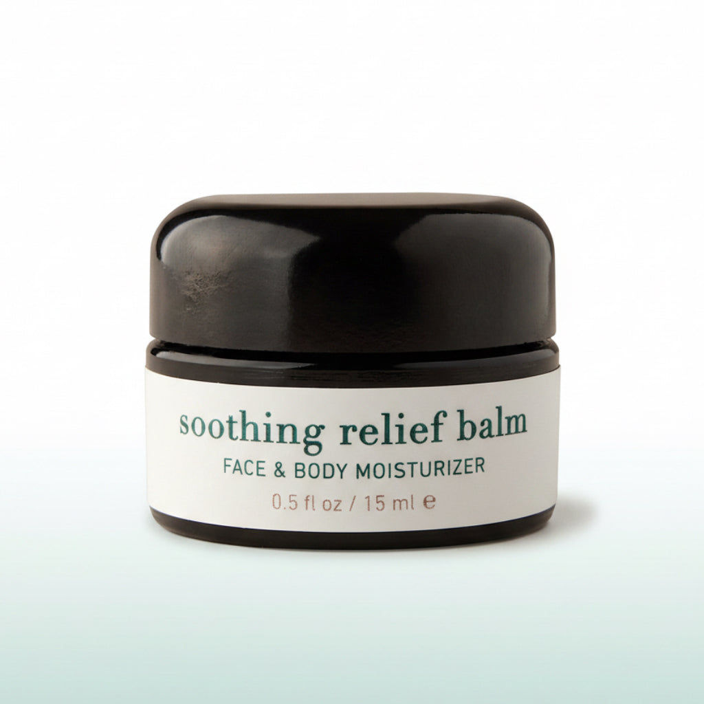 Soothing relief balm jar with black lid on a white background