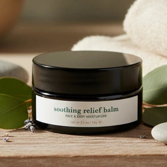 Soothing relief balm jar with black lid on a natural background.