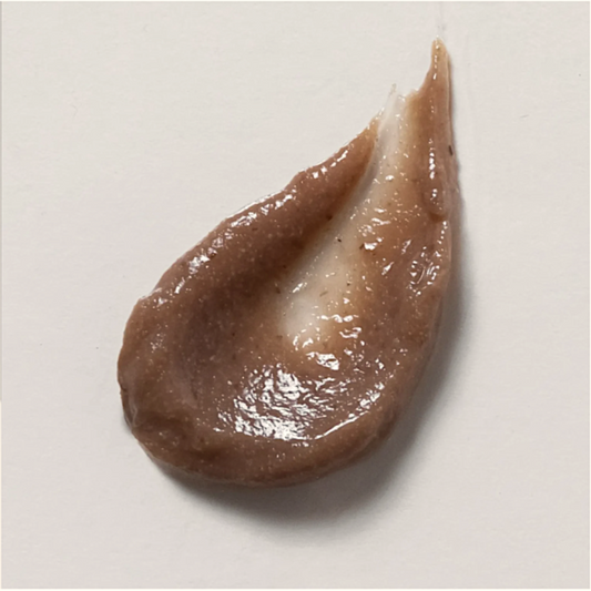 Skin Script Raspberry Scrub Brown gel-like substance on a white background